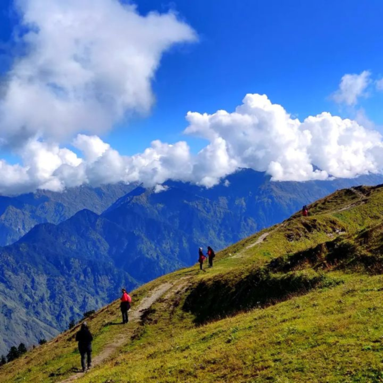 Group of trekkers walking along a scenic ridge trail with mountains in the background." Let me know if you'd like more suggestions!