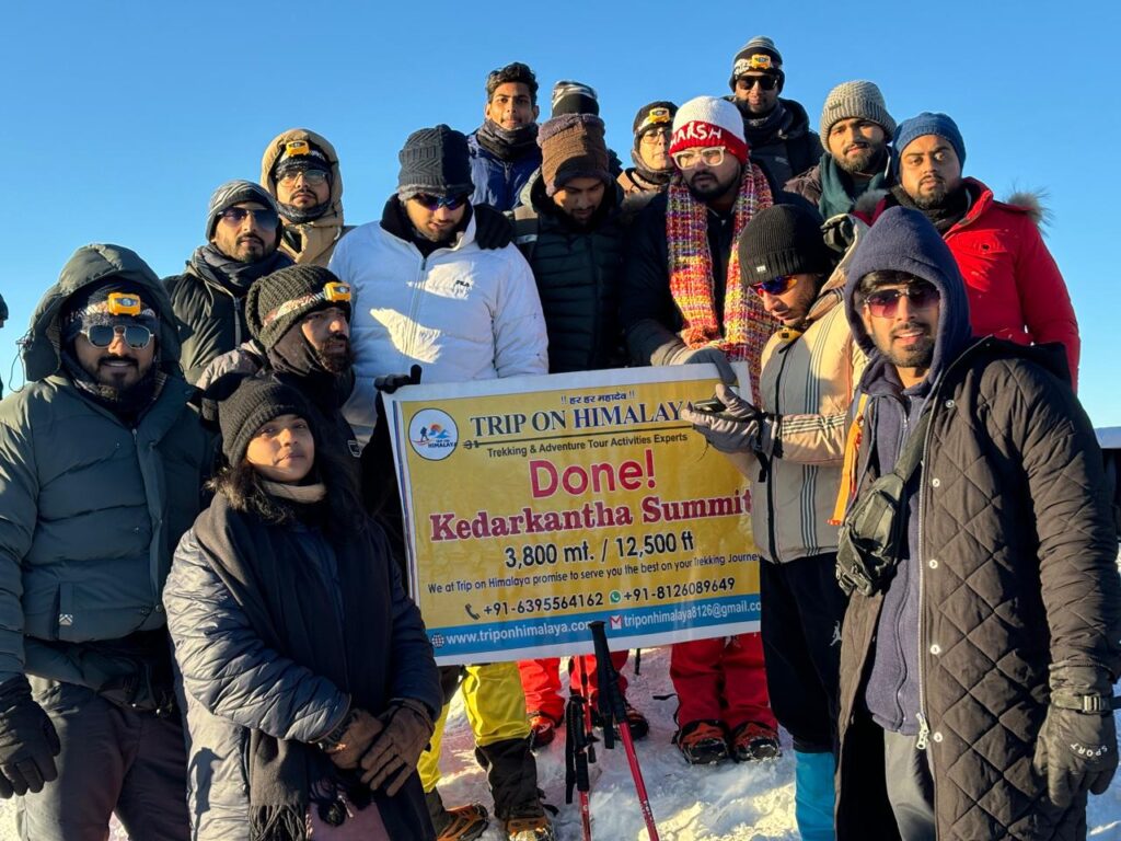 Stunning view from Kedarkantha Summit with snow-clad Himalayan peaks